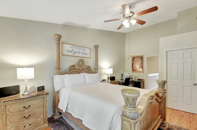 bedroom featuring light wood-type flooring and ceiling fan