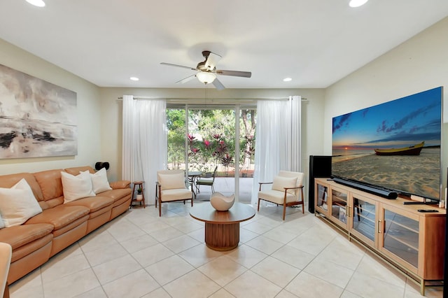 living room with a ceiling fan, light tile patterned floors, and recessed lighting