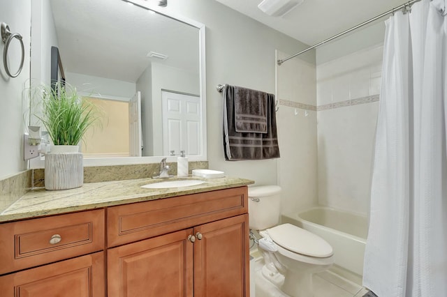 bathroom with vanity, toilet, visible vents, and shower / tub combo with curtain