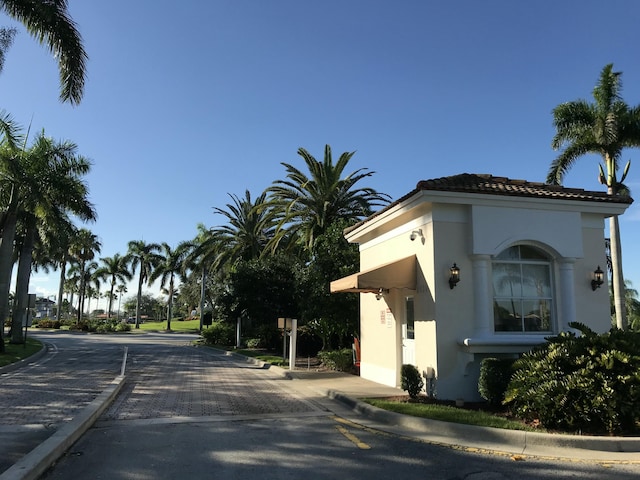 view of road featuring curbs