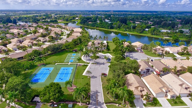 aerial view with a residential view and a water view