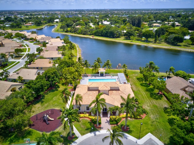 bird's eye view with a residential view and a water view