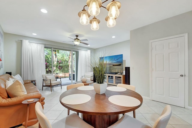 tiled dining space featuring ceiling fan