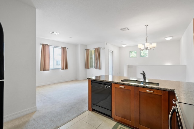 kitchen with pendant lighting, sink, range, black dishwasher, and light colored carpet