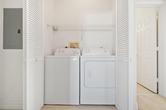 laundry room featuring independent washer and dryer and electric panel