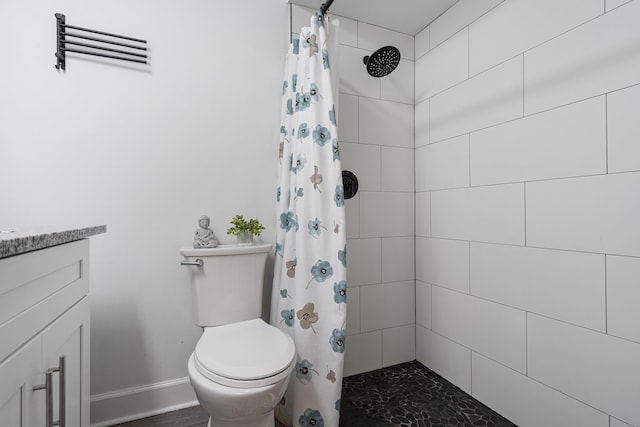 bathroom with a shower with curtain, vanity, and toilet