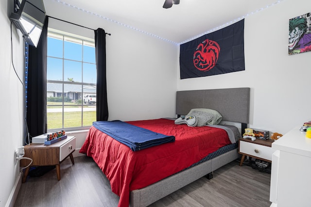 bedroom featuring ceiling fan and wood-type flooring