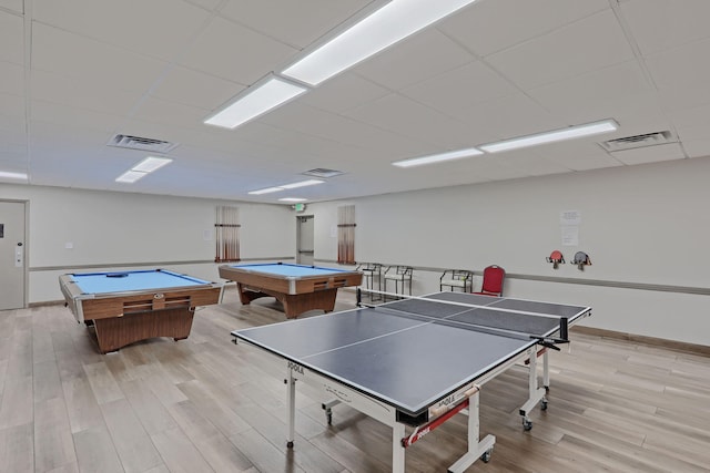 game room featuring pool table, a drop ceiling, and light wood-type flooring