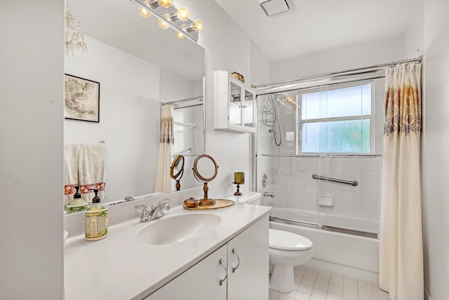 full bathroom featuring shower / bath combination, vanity, tile patterned flooring, and toilet