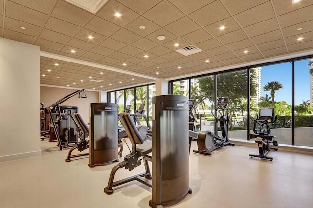 gym with floor to ceiling windows