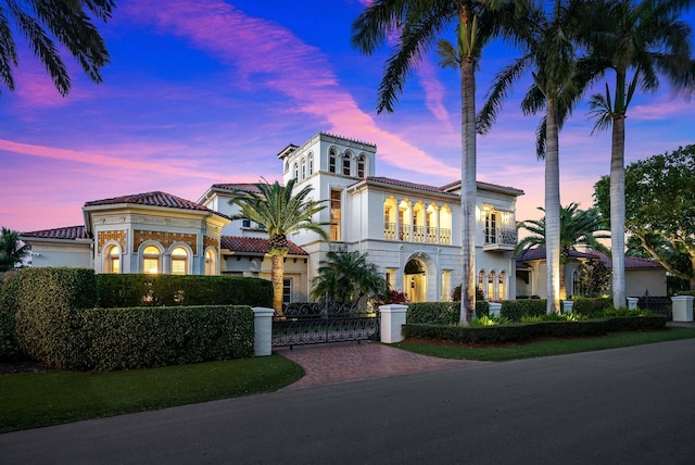 mediterranean / spanish home with a balcony