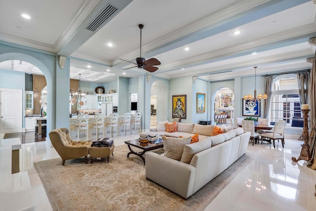 living room featuring crown molding, ceiling fan with notable chandelier, beam ceiling, and light tile patterned floors