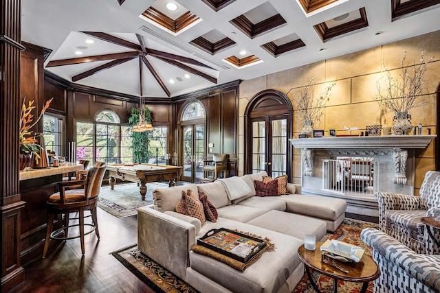 living room with a high ceiling, coffered ceiling, pool table, french doors, and beamed ceiling