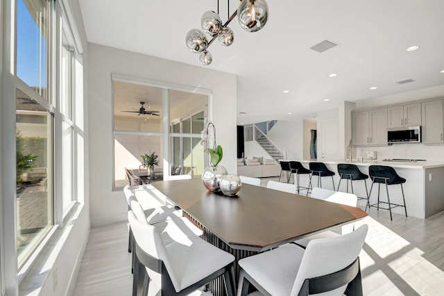 dining space featuring light hardwood / wood-style floors