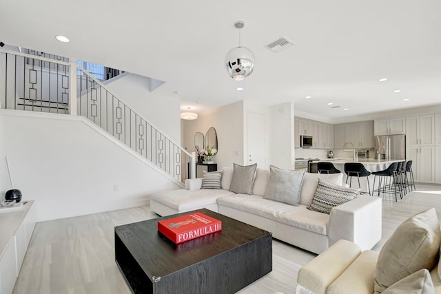 living room featuring light hardwood / wood-style flooring