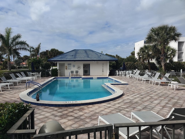 view of pool featuring a patio