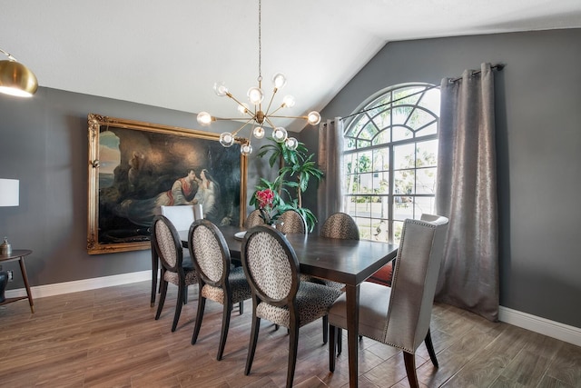 dining room with lofted ceiling, a notable chandelier, and dark hardwood / wood-style flooring