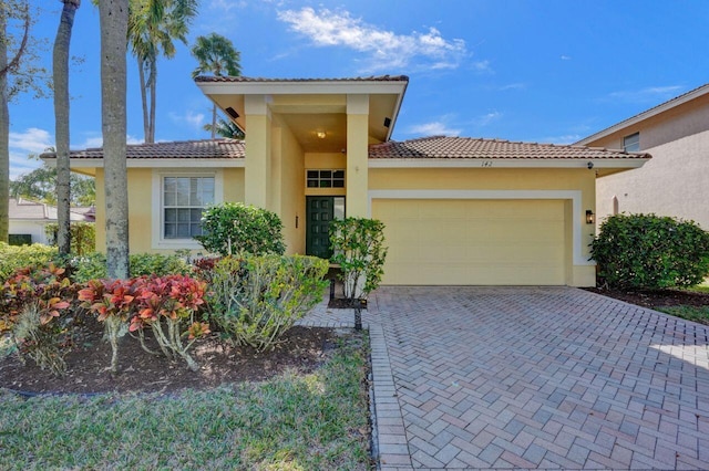 view of front of property with a garage