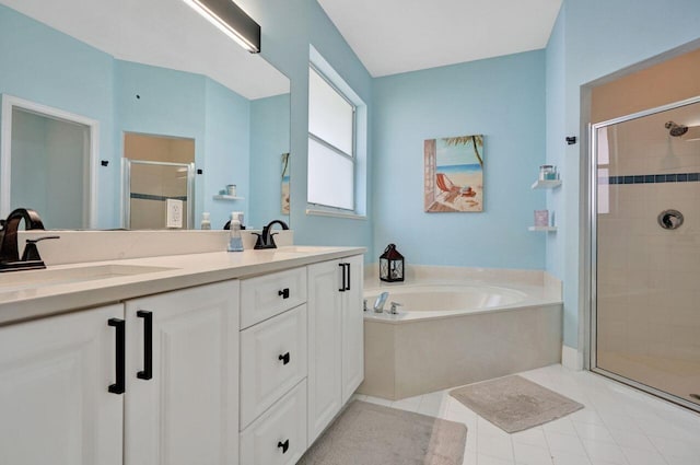 bathroom featuring independent shower and bath, vanity, and tile patterned flooring