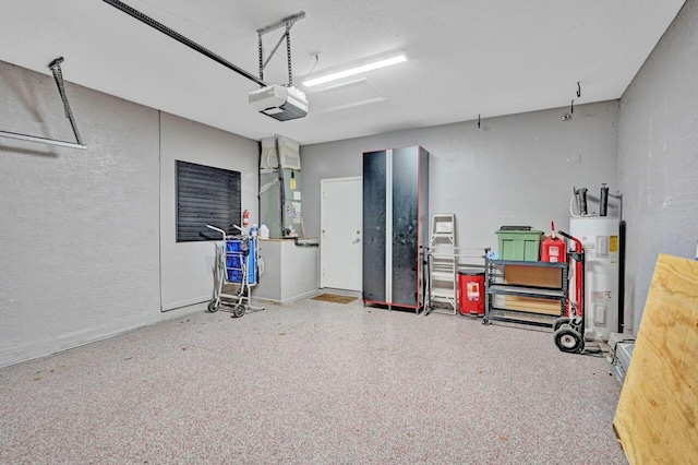 garage with a garage door opener and electric water heater