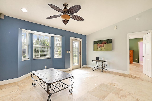 sitting room with lofted ceiling and ceiling fan