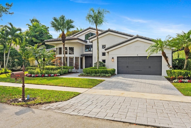 view of front of home with a garage