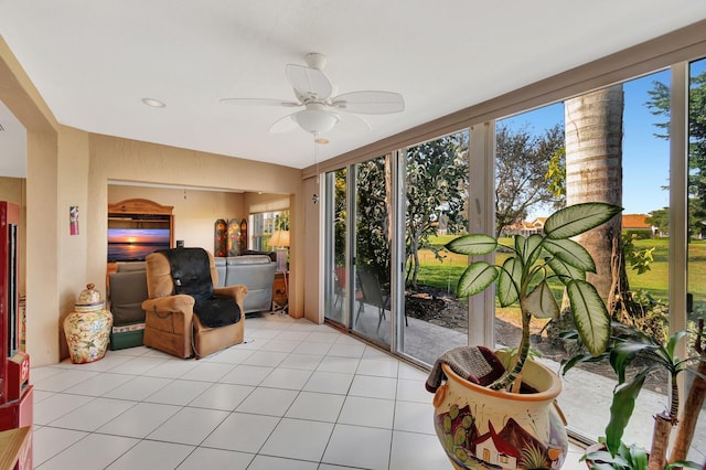 sunroom / solarium with ceiling fan