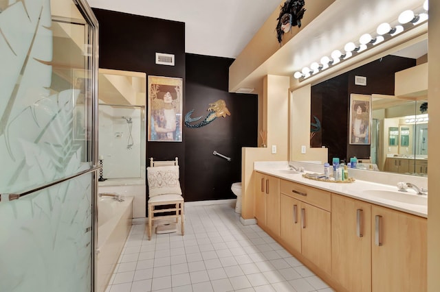 full bathroom with vanity, separate shower and tub, tile patterned floors, and toilet