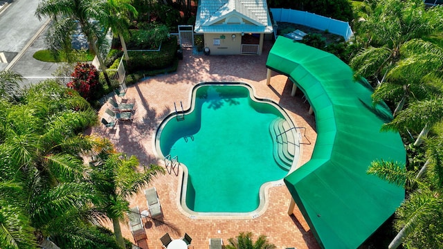 view of swimming pool with a patio