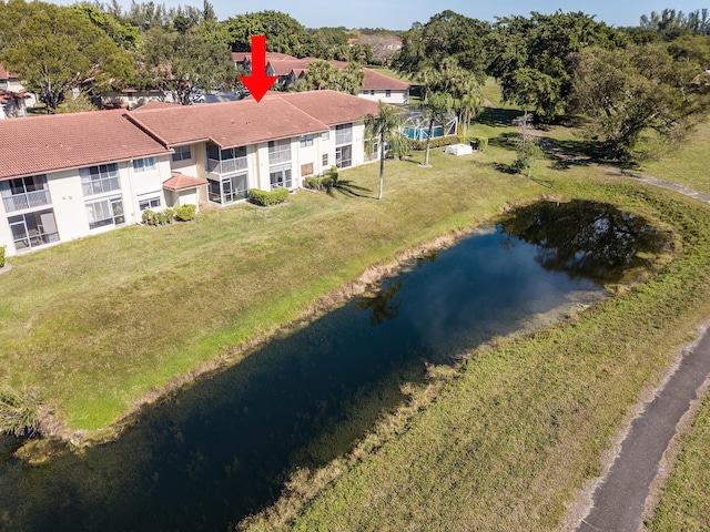 drone / aerial view featuring a water view