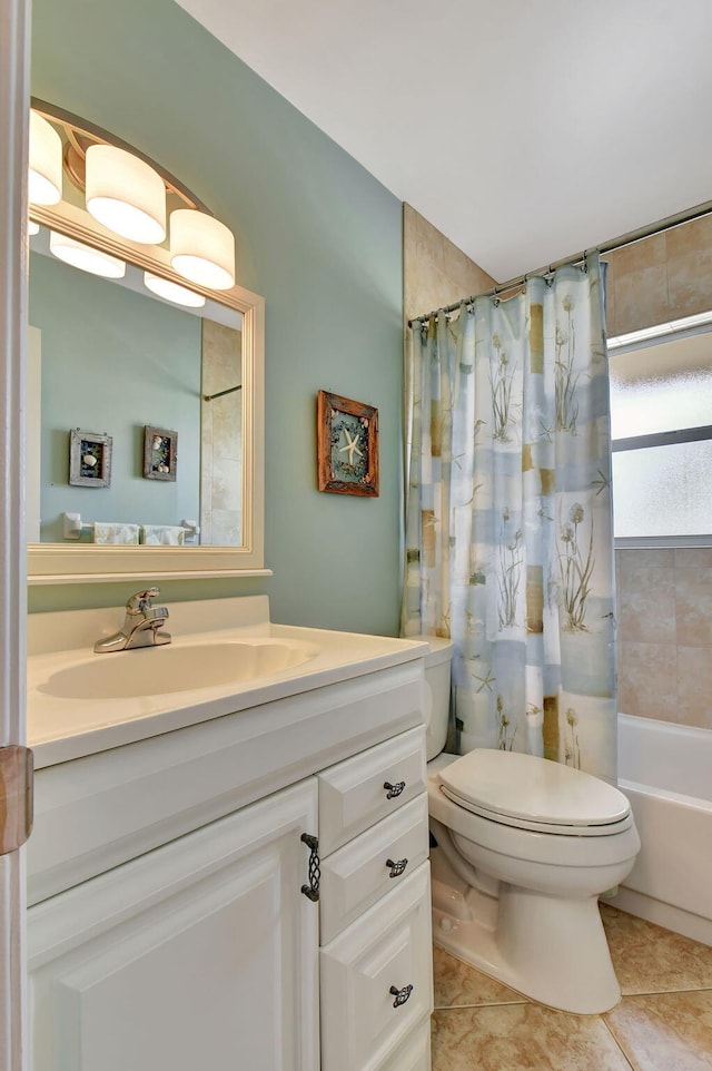 full bathroom with vanity, toilet, tile patterned flooring, and shower / tub combo