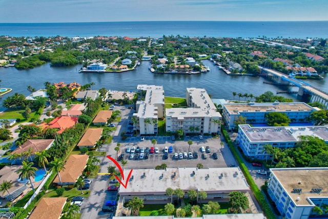 drone / aerial view with a water view