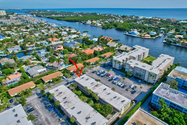 bird's eye view with a water view