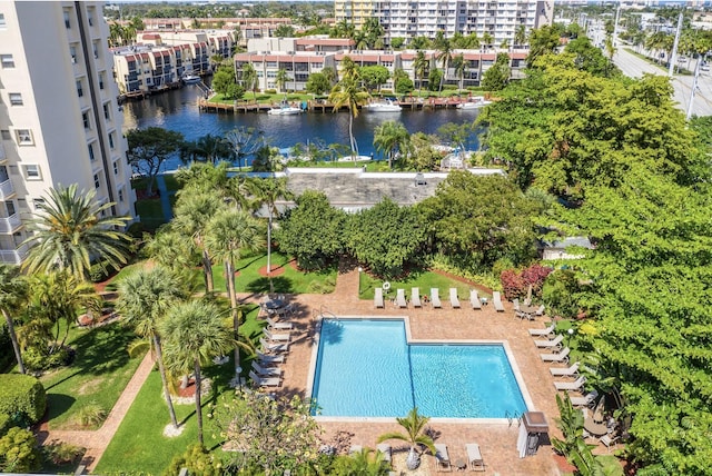 birds eye view of property with a water view