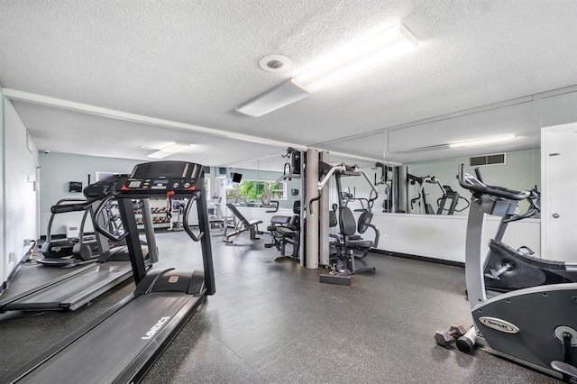 801 S Federal Hwy Unit 618, Pompano Beach, FL 33062 - workout area featuring a textured ceiling