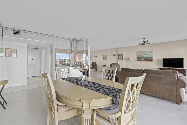 dining room featuring an inviting chandelier