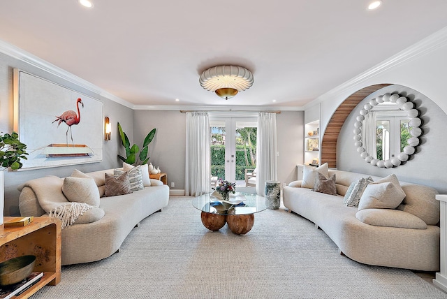 carpeted living room featuring crown molding and french doors