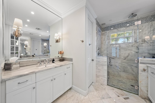 bathroom with vanity, crown molding, and a shower with shower door