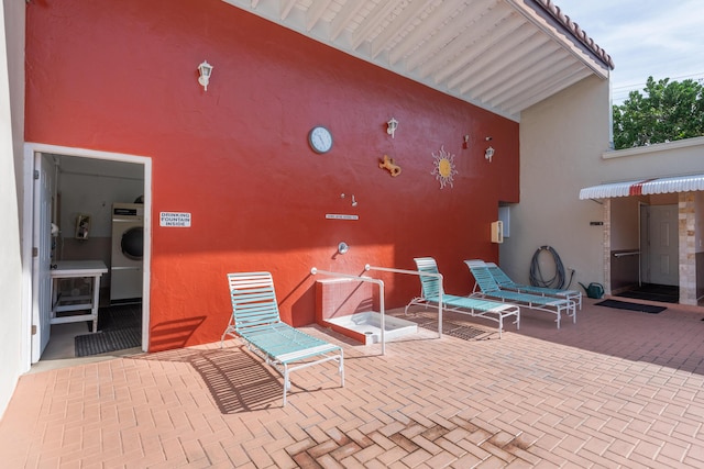 view of patio / terrace with washer / dryer