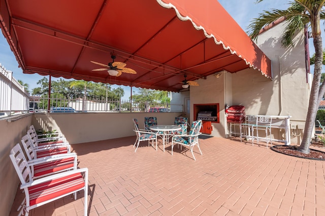 view of patio with a grill