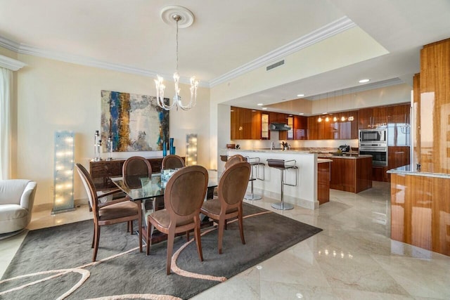 dining area with an inviting chandelier, sink, and crown molding