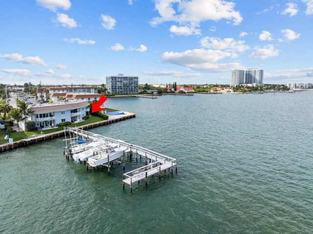 birds eye view of property featuring a water view