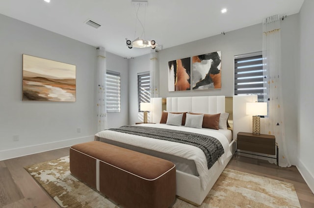 bedroom with light wood-type flooring