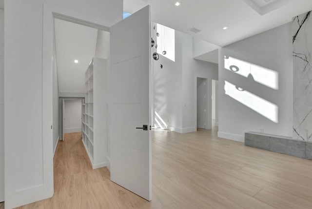 foyer entrance with light hardwood / wood-style floors