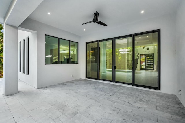 view of patio with ceiling fan