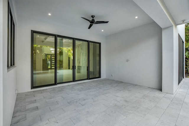 view of patio / terrace featuring ceiling fan