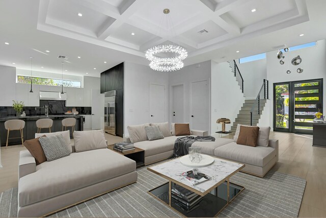 entryway featuring a high ceiling and light wood-type flooring