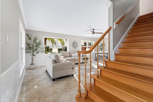 living room featuring crown molding