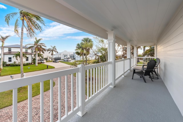 balcony featuring a porch