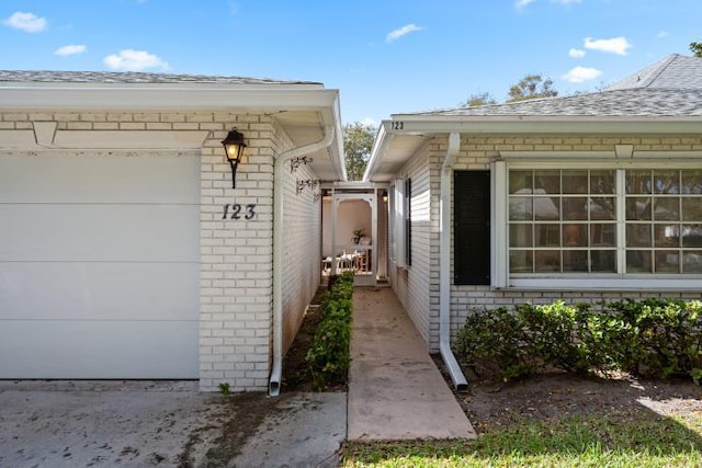 property entrance with a garage